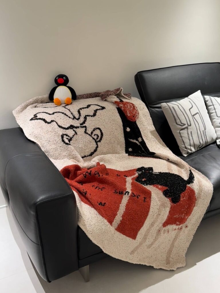 This blanket is soft and snuggly! I cant get enough of it during the winter months.