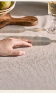 This is a high-quality tablecloth! It fits my table perfectly and has a nice weight to it. I love how it enhances my dining experience.