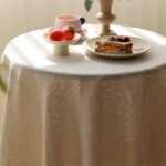 I am very impressed with the quality of this tablecloth. It feels luxurious and has a nice weight to it. Its perfect for my dining table!