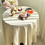 I am very impressed with the quality of this tablecloth. It feels luxurious and has a nice weight to it. Its perfect for my dining table!