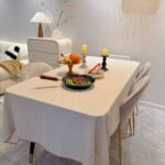 This tablecloth is stylish and affordable! It looks fantastic on my table and is very easy to maintain. Im very pleased with my purchase!