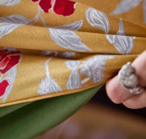 Im so glad I purchased this tablecloth! Its excellent quality and looks fantastic on my table. It has held up well against spills and stains. I would definitely recommend it to anyone looking for a good table cover!